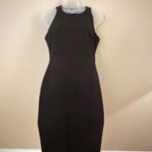 Black Banana Republic pencil style stretch dress with a front side slit size 6